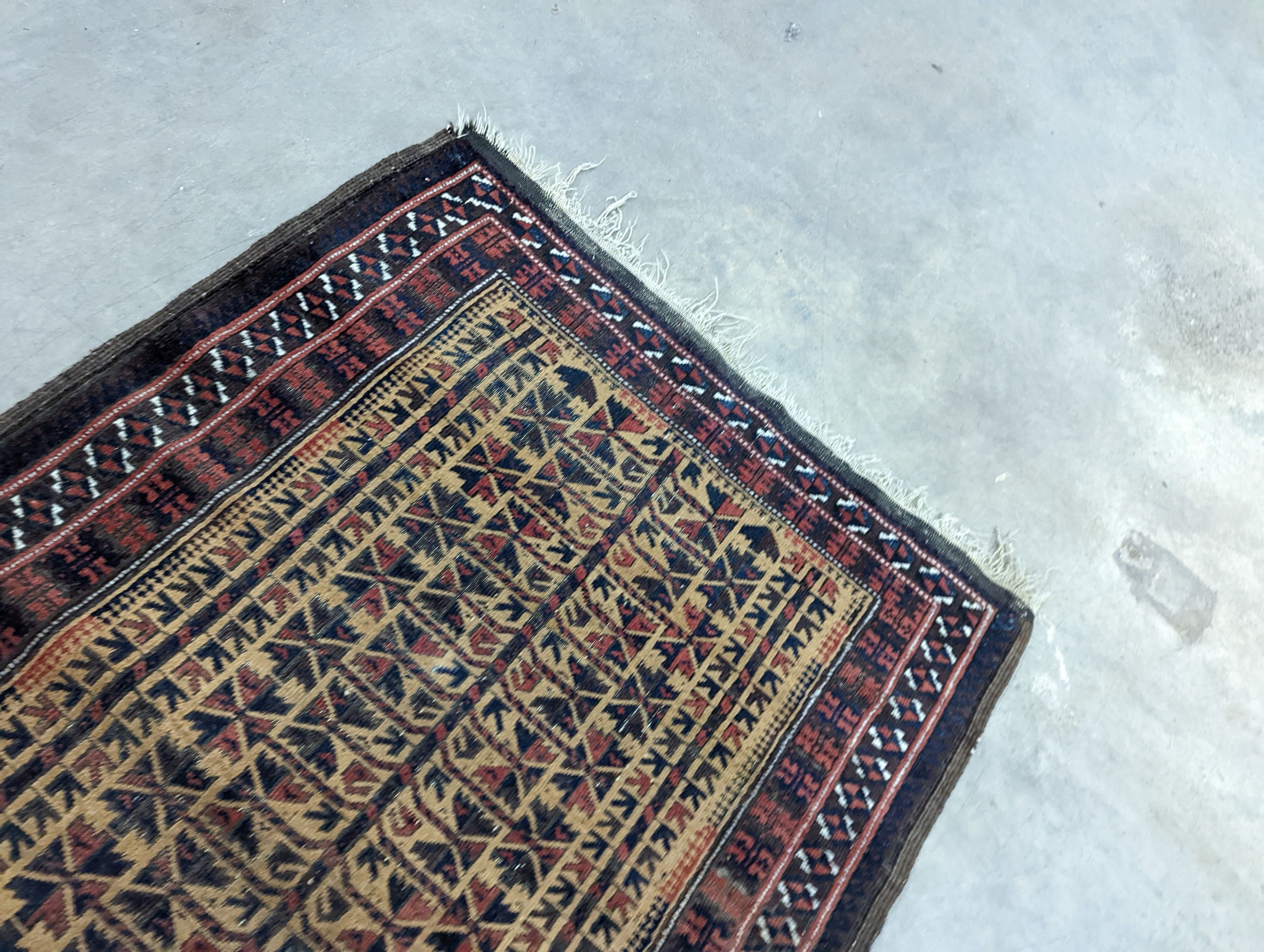 A Belouch geometric prayer rug and two Caucasian design rugs, largest 152 x 104cm